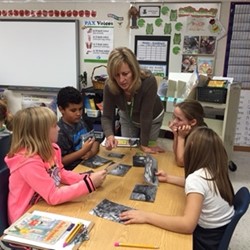 elementary teacher helps students
