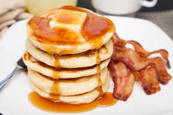 pancakes and bacon on a plate