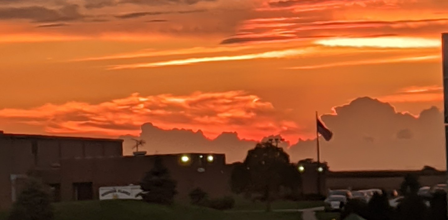 Beautiful orange sunset over the High School