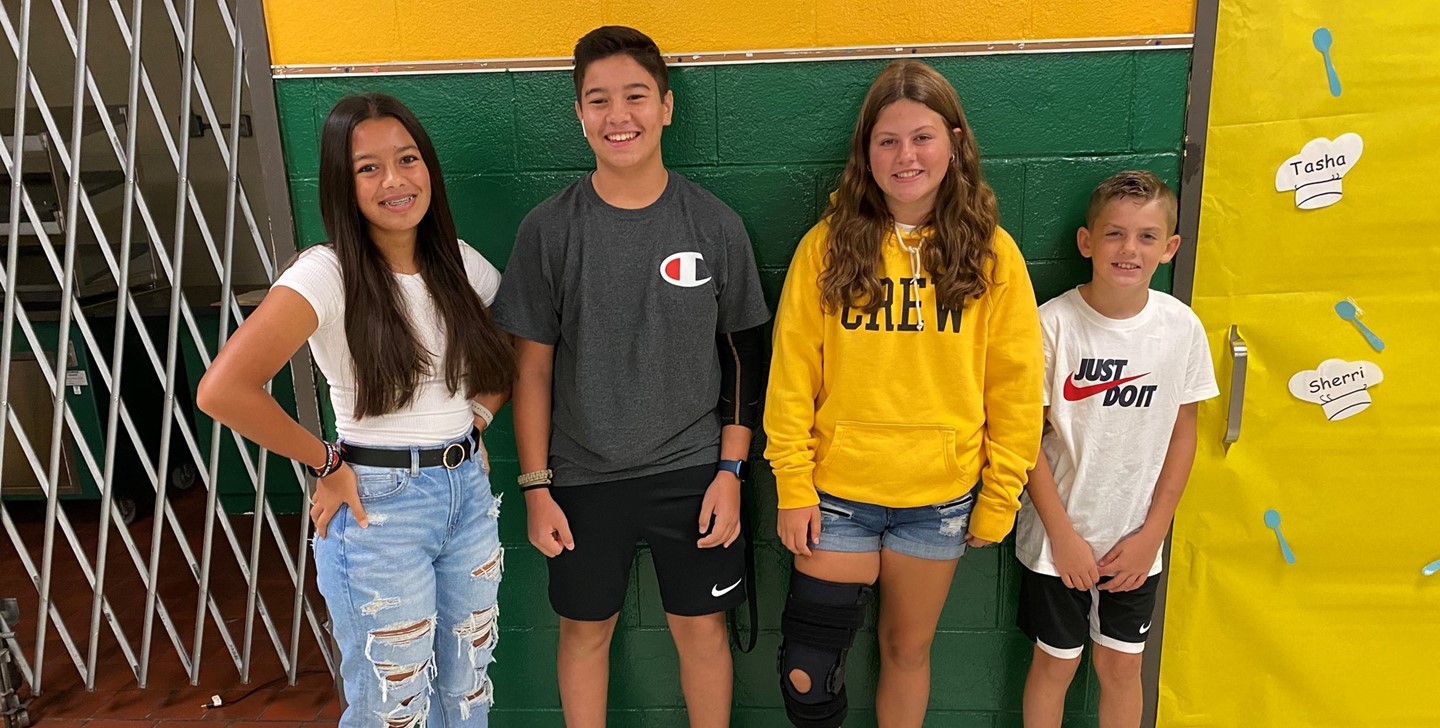 Group of friends posing on the first day of school